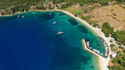 Fototapeta premium Aerial drone photo of bay and beach of Polis in Northern part of Ithaki or Ithaca island a safe sail boat anchorage, Ionian, Greece