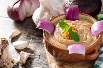 Gofio escaldado in bowl on wooden table.Copy space