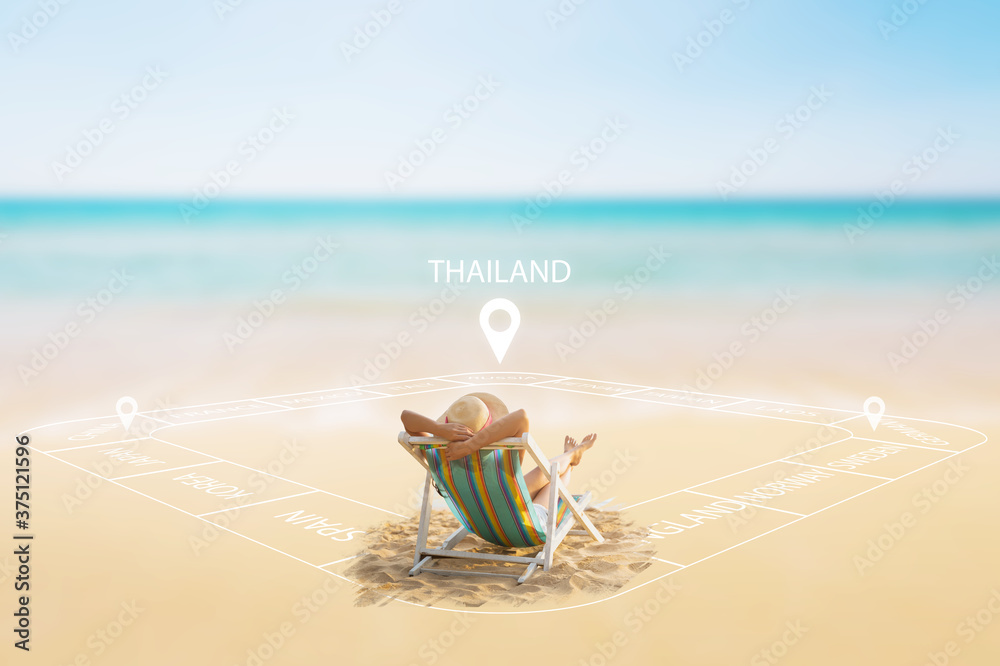 Wall mural Woman on beach with travel board game graphic in summer Thailand