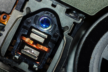Close up macro. Laser Head reader of cd player system equipment.