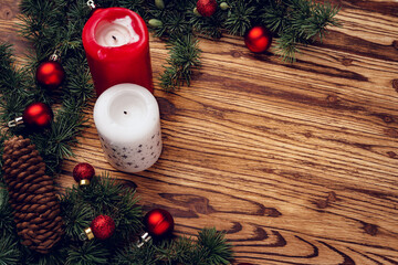 Christmas background with decorations on brown wooden board