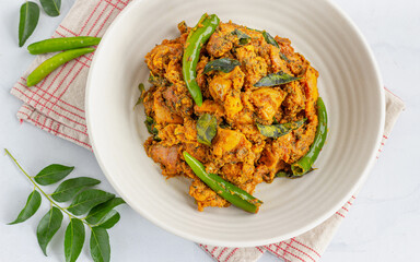 Indian Style Spicy Stir-Fried Chicken with Curry Leaves and Green Chilies 