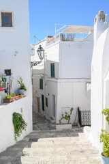 Fototapeta premium Ostuni, Bari, Italy August 2020, Ostuni is called the white city, people come to visit this old typical city of the Apulia region.