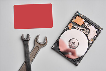Hdd - hard disk drive. Hard disk repair concept, computer industry. Disassembled hard drive from...