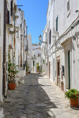 Fototapeta na wymiar Ostuni, Bari, Italy August 2020, Ostuni is called the white city, people come to visit this old typical city of the Apulia region.