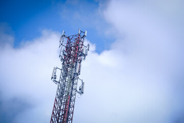 Cellular tower station for wireless telecommunication technology and Blue sky background