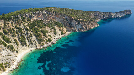 Aerial drone photo of tropical exotic bay with turquoise rocky seascape and beautiful sandy beach in Caribbean destination island