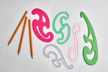 French curve ruler templates, plastic. white background