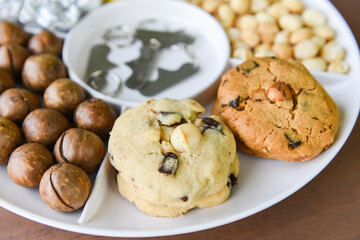 Set of macadamia nut packaging on tray plate natural high protein - cookies chocolate with macadamia nuts