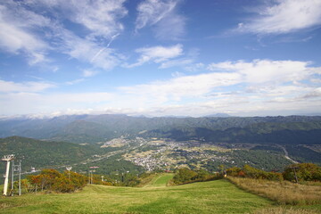 Majestic mountains landscape under blue sky with clouds in Japan