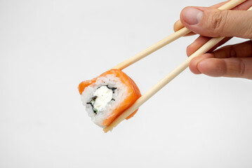 philadelphia maki rolls with soy sauce, pink ginger, wasabi on white background, asian food, japanese cuisine
