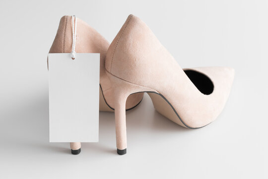 Soft Pink High Heels With White Price Tag Mockup.