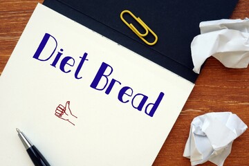 Weightloss concept meaning diet bread with sign on the piece of paper.