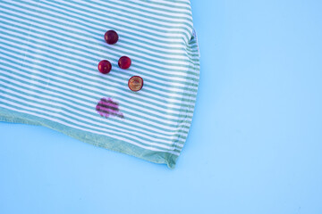 dirty stains on the tablecloth. isolated on blue table.top view