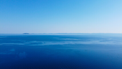 Open blue sea under blue sky.Aerial view 