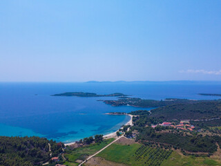 Fototapeta na wymiar Aerial view of exotic blue clear sea and tropic coast