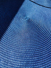 Blue serviette mat with intersting spiral texture