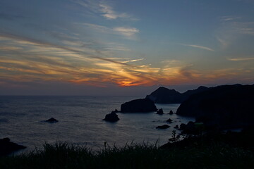 Fototapeta na wymiar Beautiful sunset at the cape, IROUZAKI in Shizuoka, Japan.