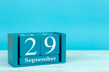 wooden calendar with the date of August 29 on a blue wooden background, World Retinal Health Day;...