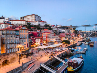 Fototapeta na wymiar Historic architecture by Douro river in Porto, Portugal