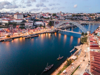 Obraz premium Aerial cityscape of Porto and Vila Nova da Gaia with connecting bridge, Portugal