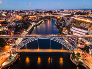 Aerial cityscape of Porto and Vila Nova da Gaia with connecting bridge, Portugal