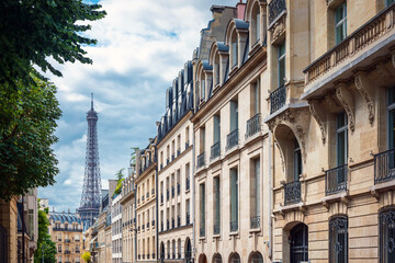 Antique building view in Paris city, France.