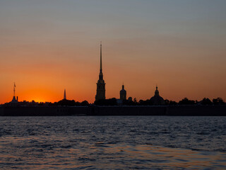Fototapeta premium panoramic view from the Neva river to the Peter and Paul fortress at sunset