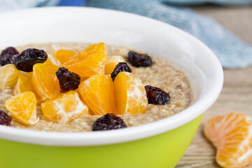 Oatmeal with dried cranberries and mandarin