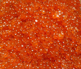 Red caviar close-up, top view, background