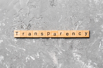 transparency word written on wood block. transparency text on table, concept