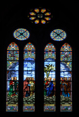 Fototapeta na wymiar Beautiful and Colorful stainglass light at catholic church.