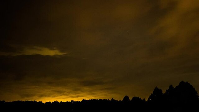 Comet C 2020 F3 NEOWISE Setting Over Trees In Sky Park, Is Covered With Clouds Timelapse