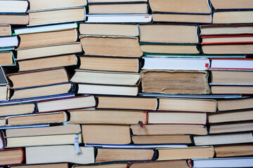 stack of old book, education concept background, many books piles with copy space for text.