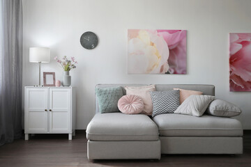 Elegant living room with comfortable sofa. Interior design