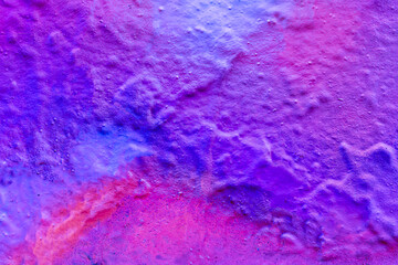 Beautiful bright colorful street art graffiti background. Abstract creative spray drawing fashion colors on the walls of the city. Urban Culture, orange , pink , purple , crimson, blue texture