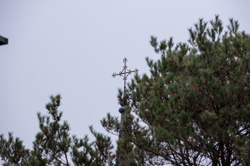 The catholic church building with cross.
