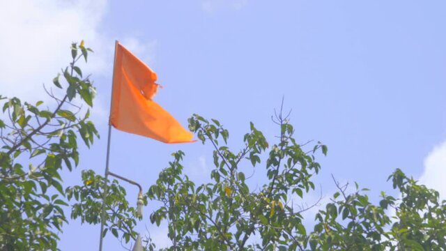 handheld Hindu flag om orange Maharashtra India Marathi