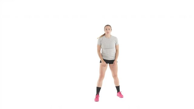 Young Caucasian sportswoman on handball training. Court player asking for pass and making feint throw. Isolated on white background