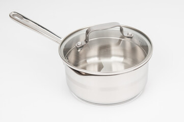 Steel saucepan close up on white background