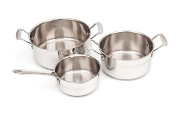 Empty stainless saucepans isolated on white background