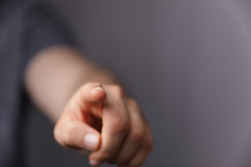 Obraz premium Hand pushing on a touch screen.