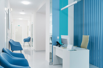 Fototapeta na wymiar Modern reception in hospital. Interior concept