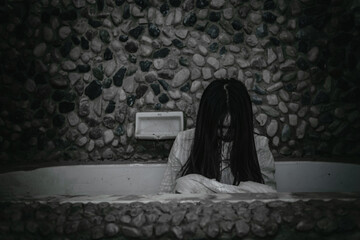Portrait of asian woman make up ghost face with blood,Horror scene,Scary background,Halloween...