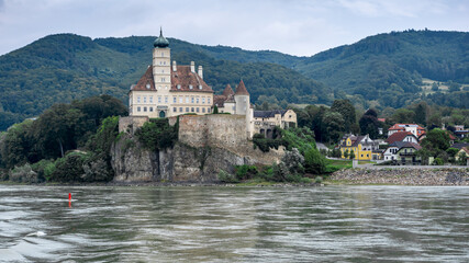 Fototapeta na wymiar Gasthof Stumpfer, Austria / Danube River - August 15, 2020: Gasthof Stumpfer and the castle 
