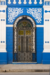 Blue facade of Obra Abierta, Cultural Center of Anthropology, Camaguey, Cuba, Unesco World Heritage...
