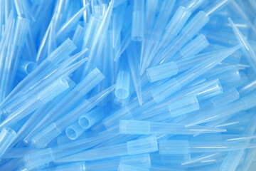 Laboratory blue tips background. Laboratory material.