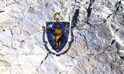 State flag of American state of Massachusetts with blue coat of arms and yellow saber at the top on...