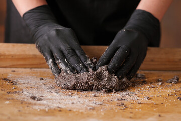 Making gluten free maize and rice flour cookies with poppy seeds, sesame and flaxseed
