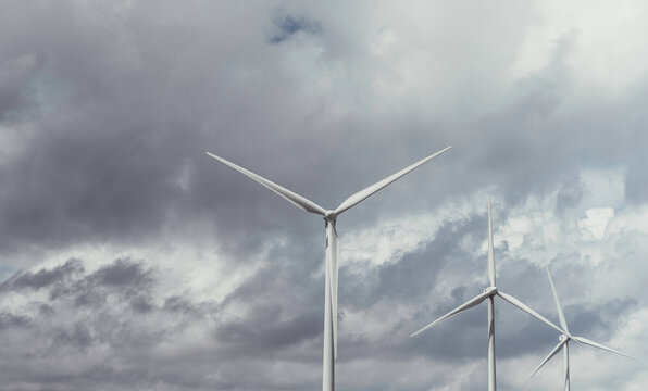 Windfarm with dark clouds.